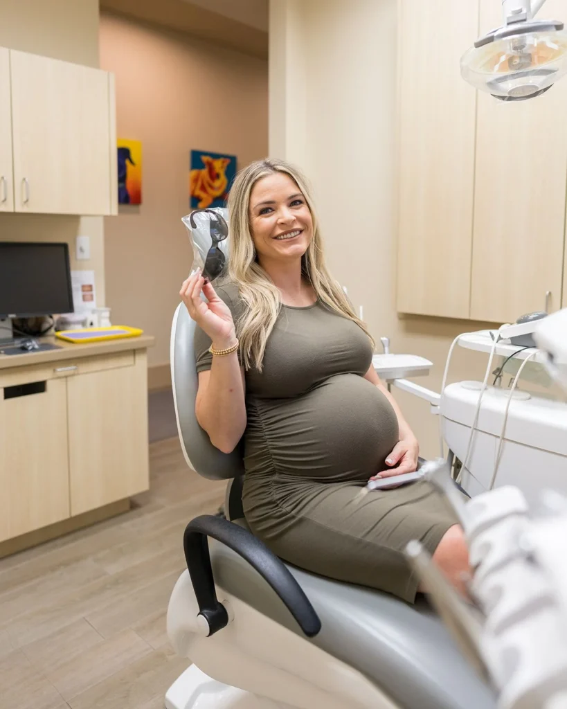 A pregnant patient smiling